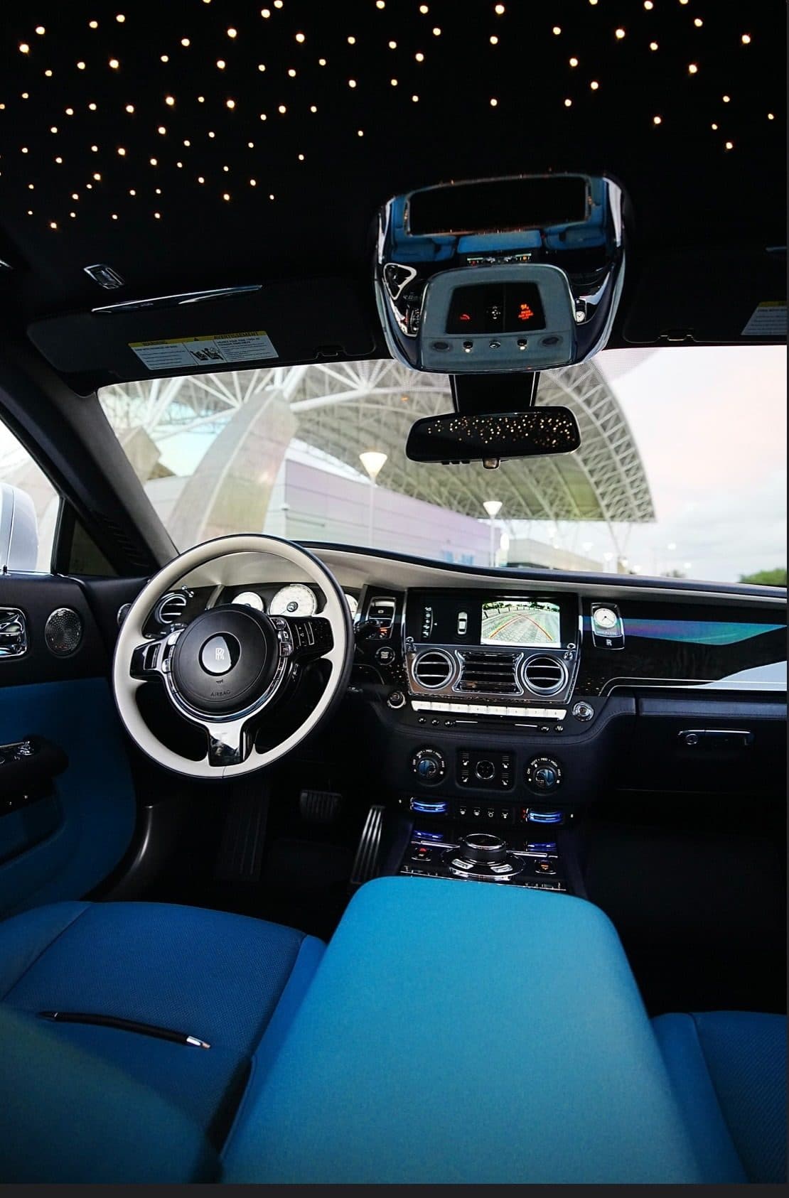 Rolls-Royce interior with starlight headliner and blue leather